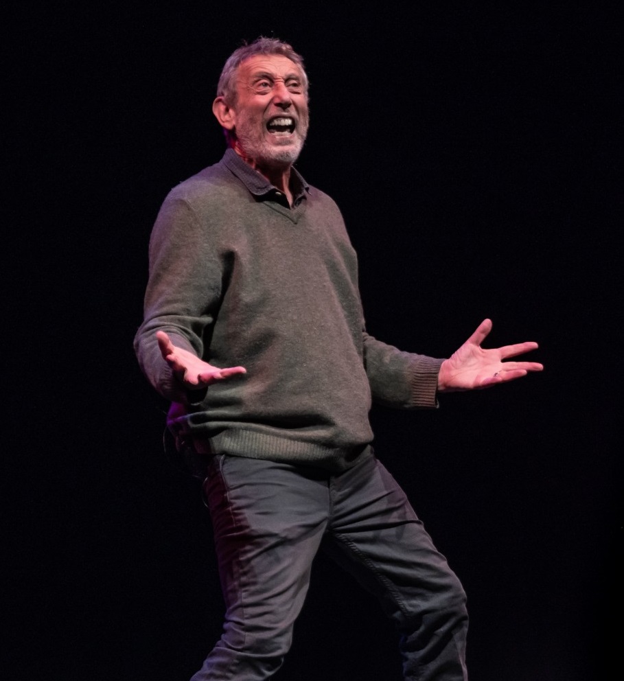 Poet Michael Rosen performing on stage